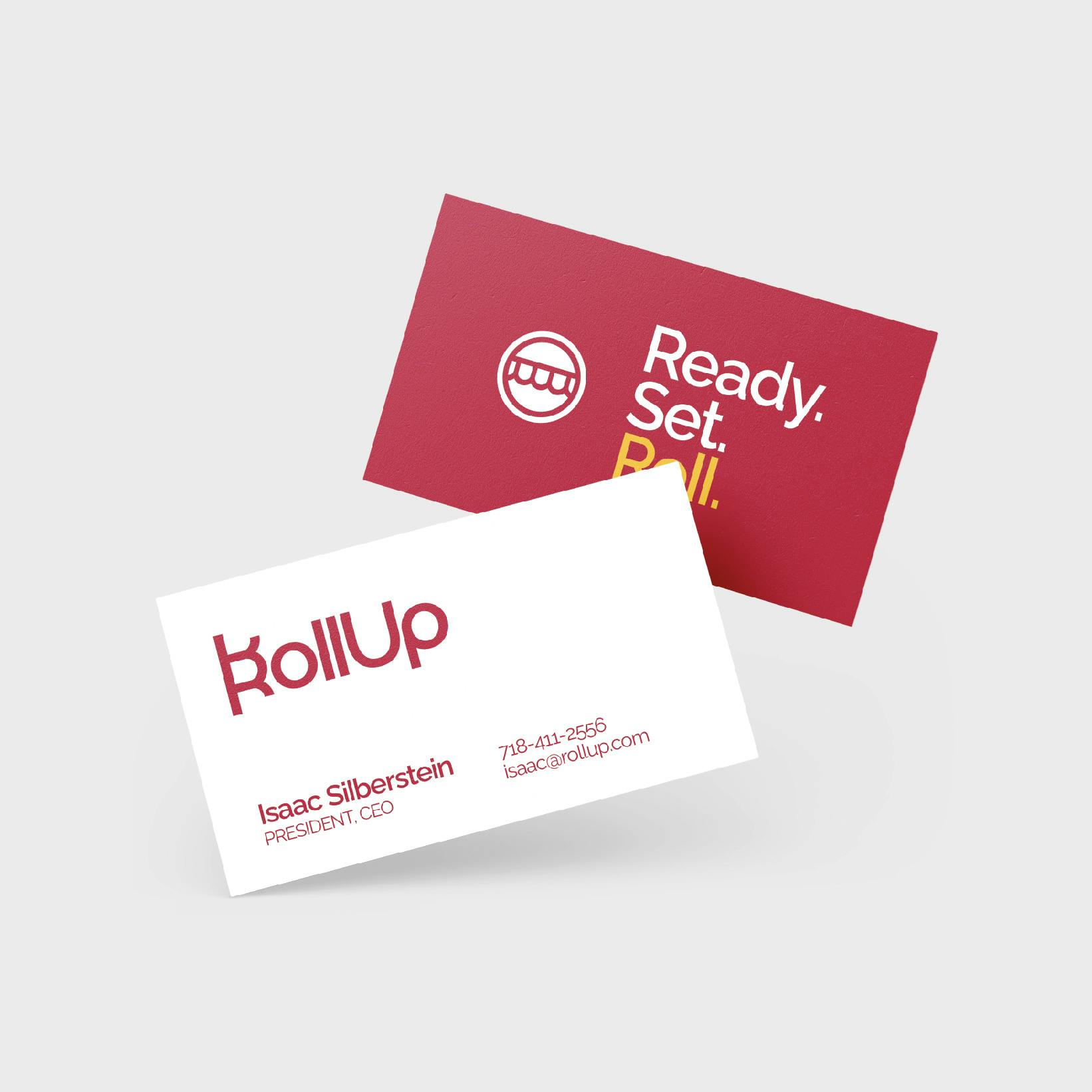 Two Business cards with RollUp Awnings logo.