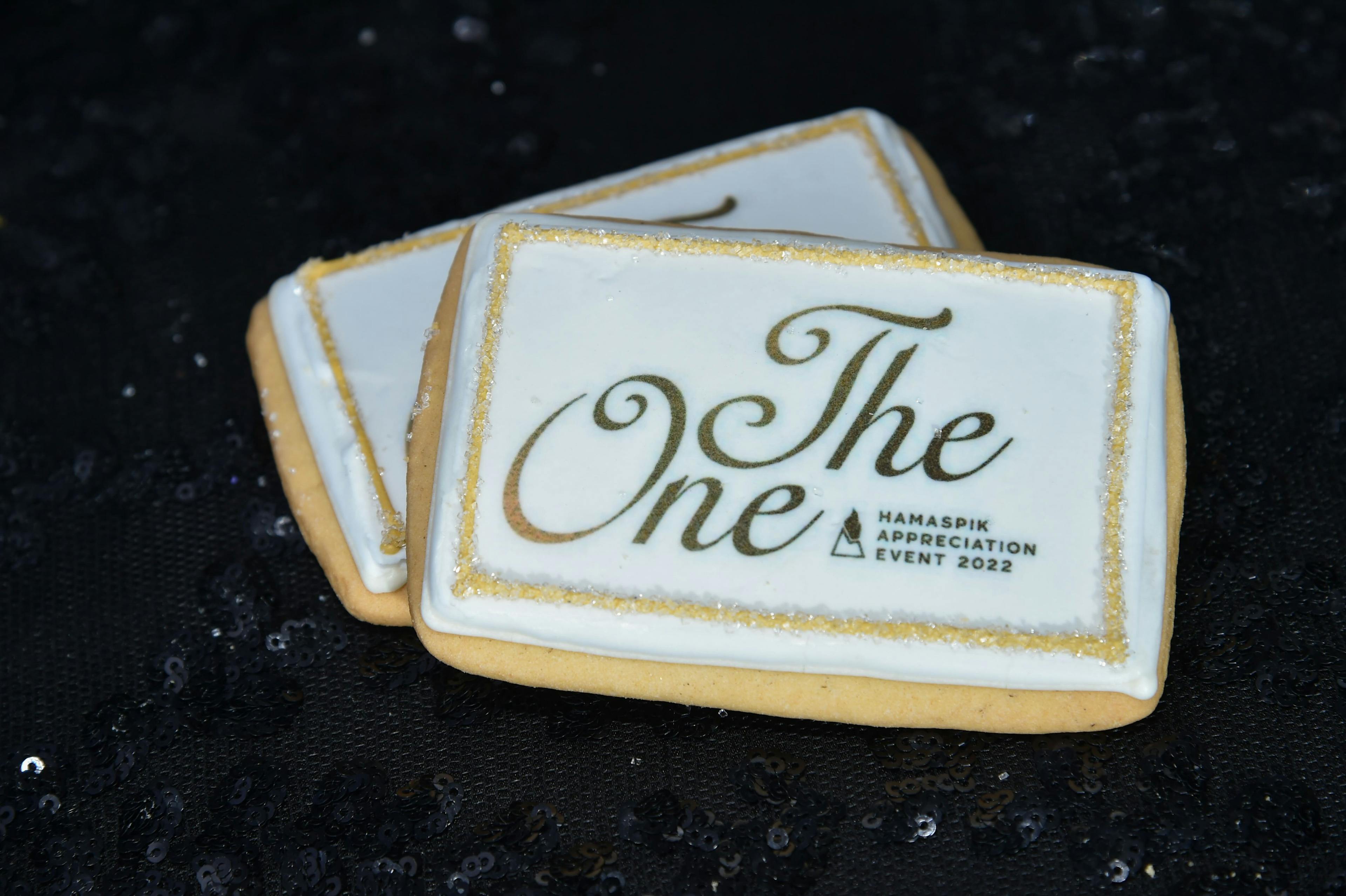 The One logo on a cookie