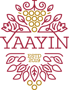 Wine store logo. Yaayin surrounded by grapes